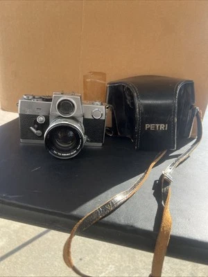 ¡¡Raro!! Cámara fotográfica Petri Flex 7 35 mm Petri 55 mm f1,8 - Para piezas o reparación Foto 1 de 4