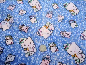 BTY Hello Kitty Kätzchen auf nicht so massivem blauem Baumwollstoff von The Yard - Bild 1 von 2