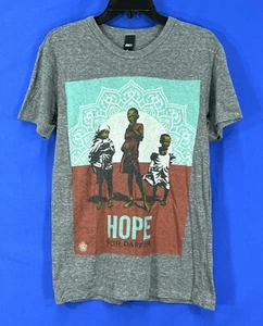 T-SHIRT MAGLIETTA vintage anni 00 y2k OBEY consapevolezza SPERANZA PER MUSSUR Africa GRIGIO maglia M - Foto 1 di 5