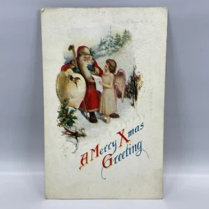 Papá Noel 1923 con bastón de piel marrón sombrero ángel postal de Navidad - Imagen 1 de 2