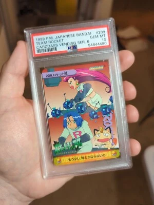 Pokemon Japanese Bandai Carddass Anime Collection #209 Team Rocket PSA 10 - Image 1 of 3