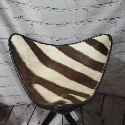 Vintage Zebra Tri leg Hunting Stool. Collapsible black wood rods brass cleats - Image 1 of 4