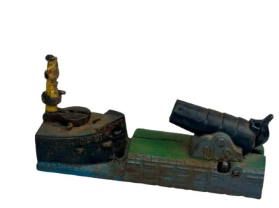 Vintage Reproduction Book of Knowledge Cast Iron Cannon Mechanical Bank.  - Image 1 of 4