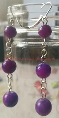 Hermosos pendientes redondos de sugilita púrpura natural de 8-12 mm Foto 1 de 4