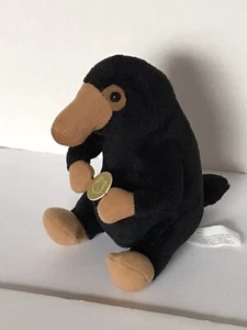 Peluche Niffler Harry Potter Animales Fantásticos 7” con moneda. JK Rowlings WB - Imagen 1 de 8