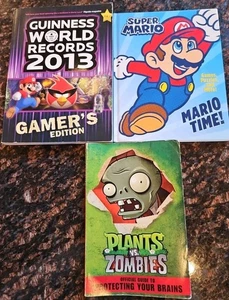 Lot 3 Kids Gaming Books, Super Mario, World Records, Plants Vs Zombies - Imagen 1 de 14