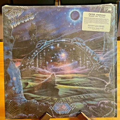 Fates Warning – Awaken The Guardian LP Enigma / Metal Blade 1986 VG+ shrink hype - Image 1 of 4