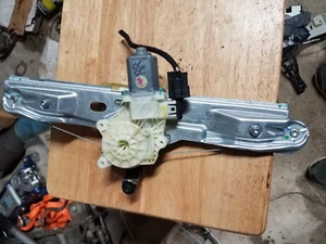 2012-2014 FORD FOCUS SEDAN RIGHT PASSENGER REAR WINDOW MOTOR USED OEM - Picture 1 of 3