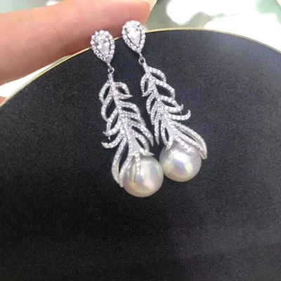 lindo par de brinco redondo de pérola branca 10-11mm mar do sul (t) - Imagem 1 de 3