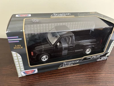 1992 GMC Sierra GT Black Pickup Truck 1/24 Diecast Model by Motormax - Image 1 of 3