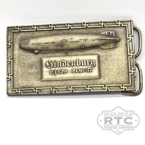 Hebilla de cinturón Hindenburg Zepplin 1976 vintage de latón macizo - Imagen 1 de 2