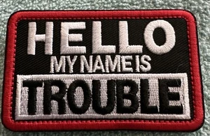 HELLO MY NAME IS TROUBLE 2x3 Embroidered Morale Patch Hook Backing Brand New - Picture 1 of 4