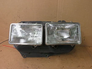VOLVO 240 81-85 VOLVO 260 78-82 HEADLIGHT DUAL SQUARE BUCKET + RINGS PASSENGER - Picture 1 of 7