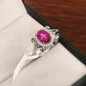 Anillo de compromiso de plata con halo solitario ovalado estrella Lindy rosa zafiro, - Imagen 1 de 9