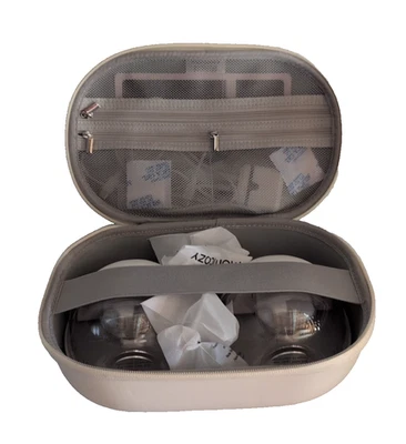 Extractor de leche doble portátil estilo móvil Momcozy Foto 1 de 4