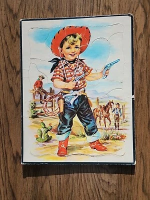 Antigo quebra-cabeça bandeja de cowboy infantil B. Lopez Western Sheriff Boy pistolas 1959 - Imagem 1 de 4