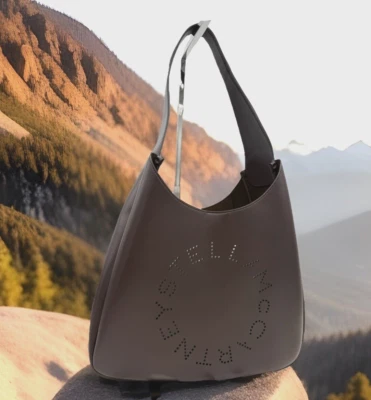 AUTÉNTICO NUEVO CON ETIQUETAS Stella McCartney Logo Perforado Alter Napa Cuero Hobo-Chocolate Foto 1 de 4