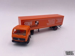 Wiking MB Mercedes NG semirimorchio arancione/nero "staff comfort luminoso" 1:87/WI933 - Foto 1 di 1