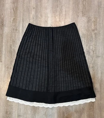 Falda midi plisada negra Ann Taylor dobladillo de encaje gótica caprichosa bruja talla 6 Foto 1 de 4