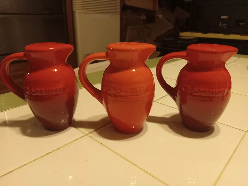 Salero y pimentero rojo Le Creuset + 1 naranja Foto 1 de 4