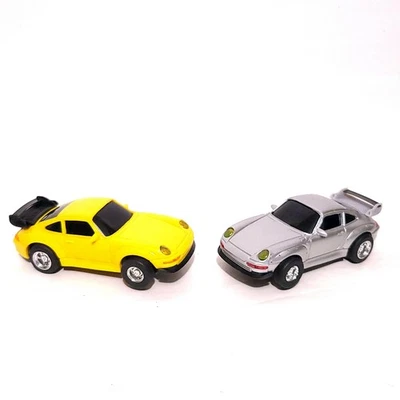 Pair Of 1:43 Scale Slot Cars Tested And Works  Porsche Yellow And Silver - Image 1 of 4