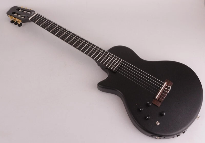 Guitarra Clásica Eléctrica Mano Izquierda Cuerda de Nylon Silenciosa Viaje Portátil Foto 1 de 4
