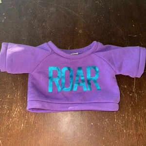 Camiseta Build A Bear púrpura “ROAR” - Imagen 1 de 4