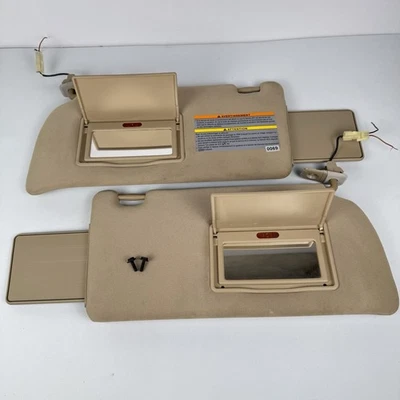 Par de parasoles Nissan Pathfinder 2005-2012 conductor pasajero tela tostada probado OEM Foto 1 de 4