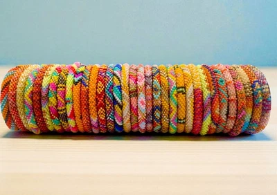 6 piezas - Mezcla aleatoria de pulseras enrollables con cuentas de semillas de vidrio de Nepal - NARANJAS Foto 1 de 3