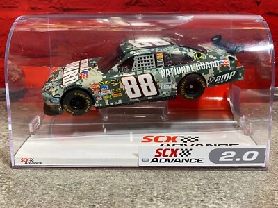 SCX Escala 1/32 NASCAR Advance 2.0 Earnhart 88 Camuflaje - Nuevo Foto 1 de 4