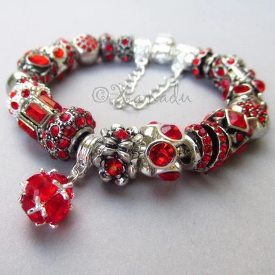 Pulsera con dije europeo rojo rubí piedra natal julio con cadena de seguridad Foto 1 de 4