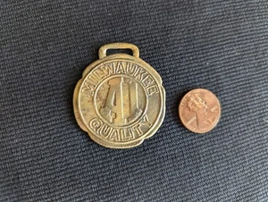 Vintage MILWAUKEE Quality A1 Brass Watch Fob Merchants & Manufacturers Assoc - Foto 1 di 2