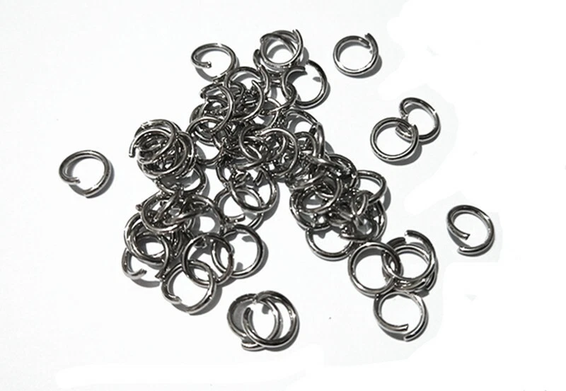 100 pz anellini in acciaio inox colore argento scuro 7x1mm bijoux - Immagine 1 di 1