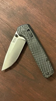 Hoja de aleta de borde liso SOG Terminus XR-CRYO CTS-BDZ1 - Manijas de fibra de carbono/G10 Foto 1 de 4