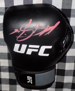 Guante de Boxeo UFC Firmado Henry Cejudo 2 Cinturones Campeón UFC - Imagen 1 de 1