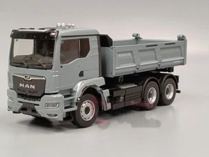 81254E - Conrad - MAN eTGS NN Meiller Trigenius Dreiseitenkipper Artic Blue Neu - Picture 1 of 4