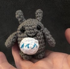 A Mini Crocheted Amigurumi Totoro Stuffed Toy