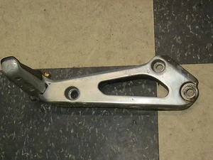 1982-1983 Suzuki GS1100ED right rear passenger foot step unit with mount bracket - Picture 1 of 2