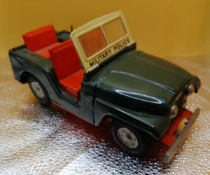 Military Police Jeep friction car vehicle made in Japan orange seats - Picture 1 of 5