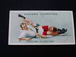 1913 John Player & Sons Wrestling & Ju-Jitsu Tarjeta # 24 Head and Leg Hold (EX) - Imagen 1 de 3