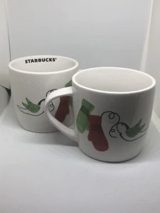 Juego de 2 tazas de café Starbucks mitones y paloma pájaro Navidad 2011 10 oz sin usar - Imagen 1 de 2