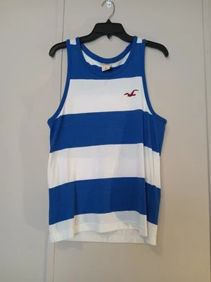 Camiseta sin mangas Holister para hombre talla pequeña a rayas azules y blancas Foto 1 de 3