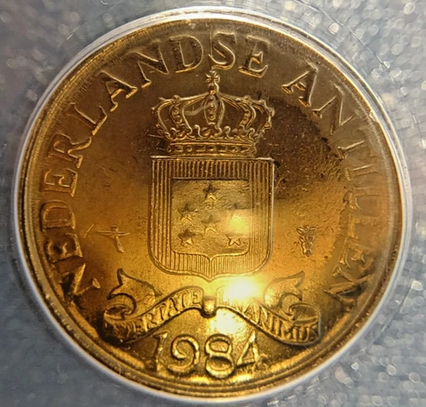 1984 Netherlands Antilles 25 Cents ANACS MS65 Struck Through Grease Error Cover