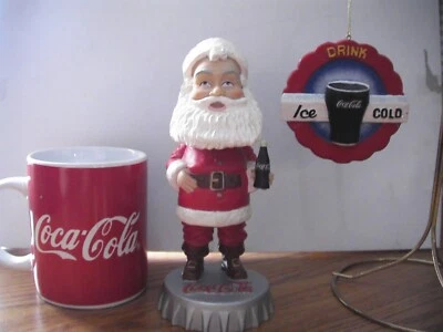 Coca Cola Santa Claus Bobble Head, Ornament, and Cup - Image 1 of 4