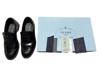 MOCASINES PRADA INFORMALES CUERO NEGRO HECHOS EN INGLATERRA TALLA 38 UE LA CAJA Foto 1 de 4