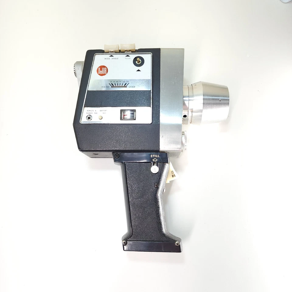 Кинокамера DeJUR Dyna-Zoom DE70 8 мм пленочная зеркальная Slo-Motion - непроверенная - Изображение 1 из 4