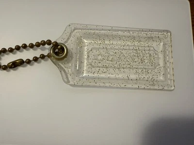 Llavero Coach Oro Transparente Brillo Acrílico Etiqueta Colgante Accesorio Brillo Brillante Foto 1 de 4