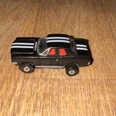Coche Ranura Vintage Años 60 AURORA T JET MUSTANG Ho Negro Blanco Rayas Foto 1 de 4