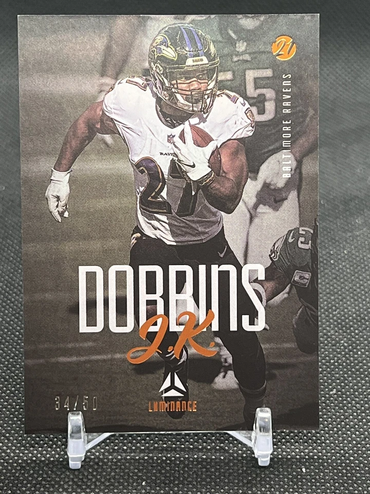 K49,033 - 2021 Panini Luminance Orange #8 J.K. Dobbins #/50 - Image 1 of 3