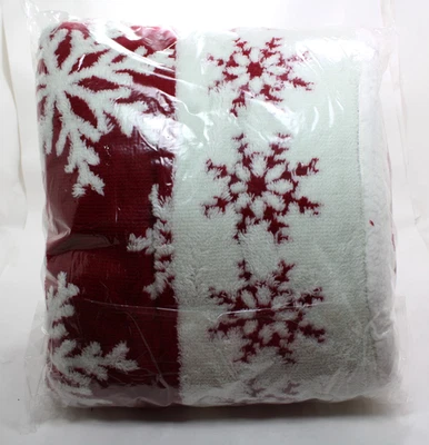 Manta de felpa roja y blanca con copos de nieve firma HomeStyles NUEVA en bolsa. Foto 1 de 4